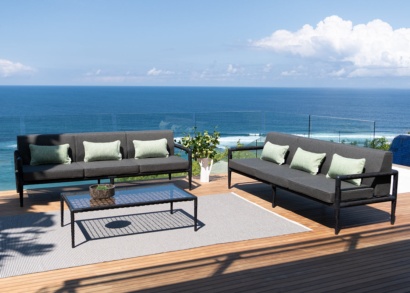 Marina all weather sofa in black rope with anthracite powder-coated frame.