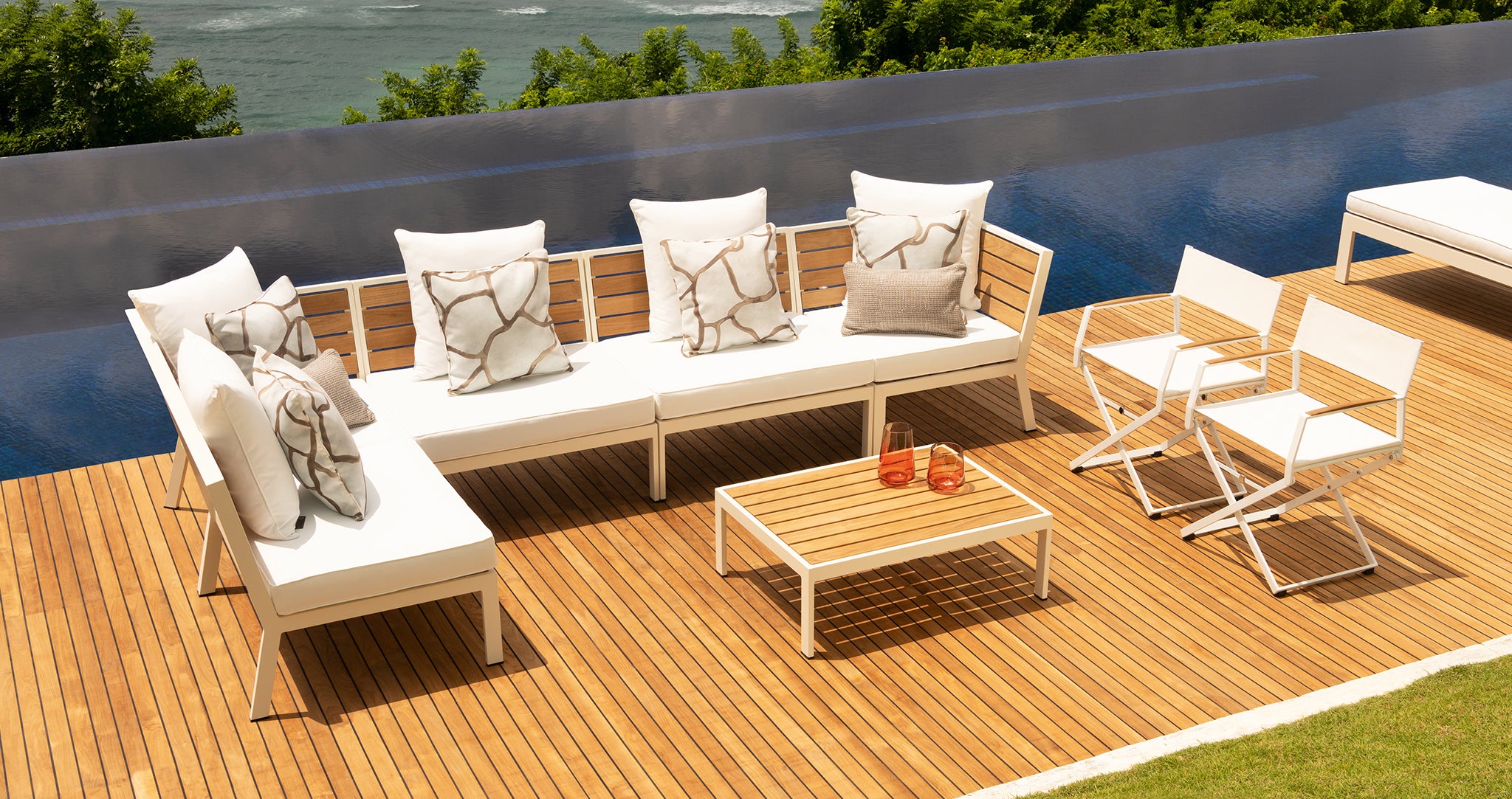 Oslo Modular Sofa Collection, white powder-coated outdoor sofa with luxury scatter cushions