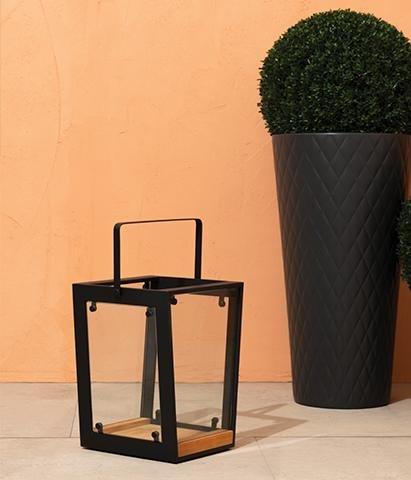Luxury outdoor lantern in front of orange wall