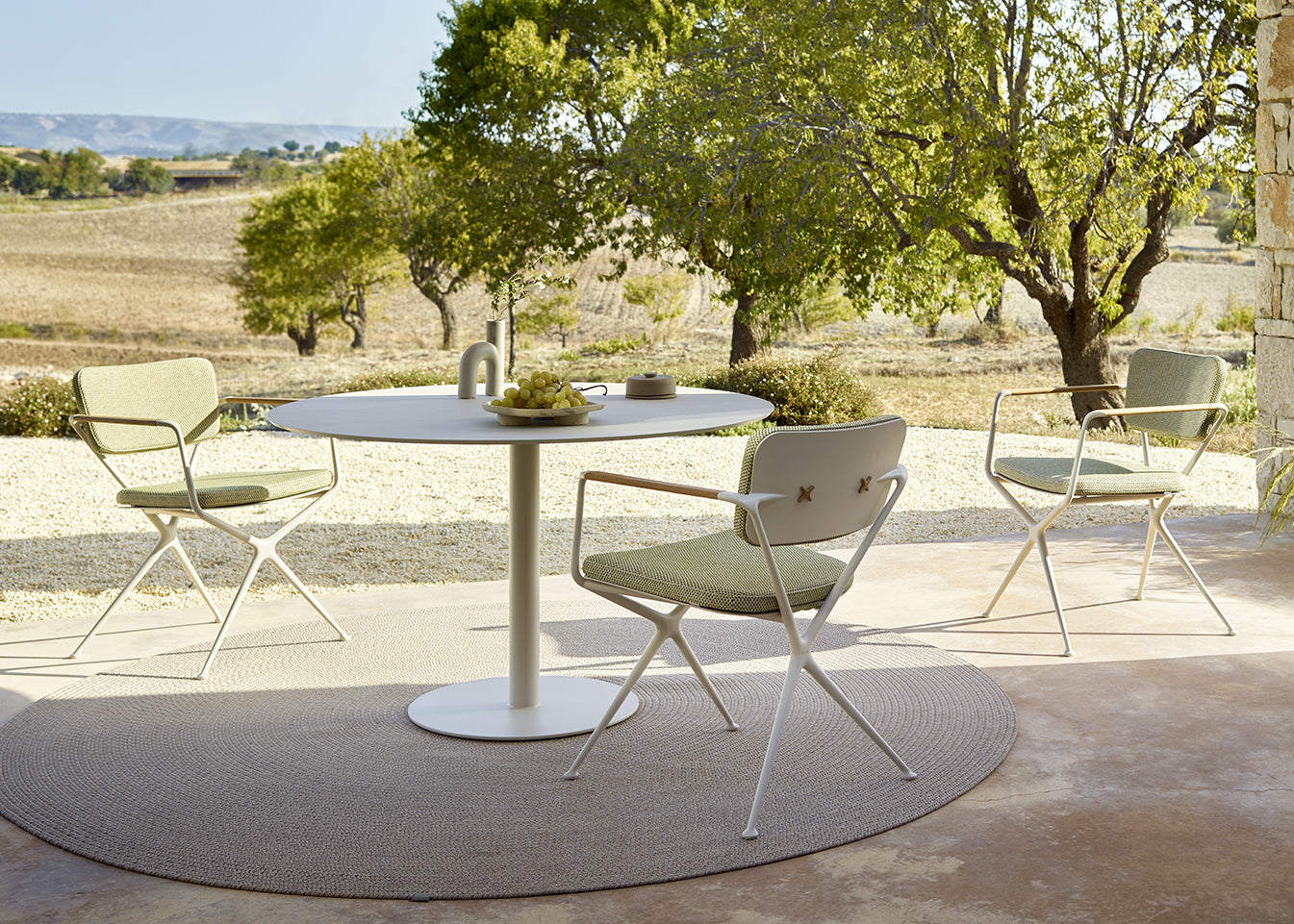 Luxury teak outdoor furniture, with powder-coated frame and luxury scatter cushions.