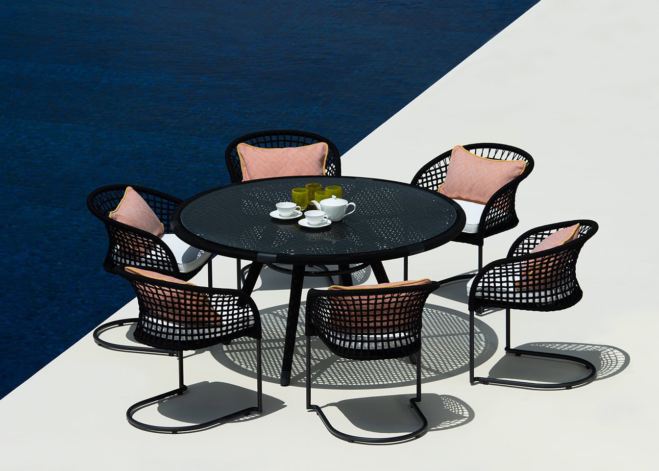 Marina round dining table with curve chairs