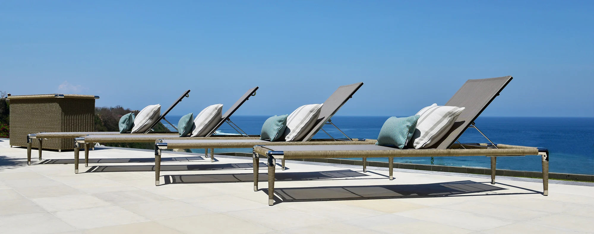 Black Marina sun lounger by the pool